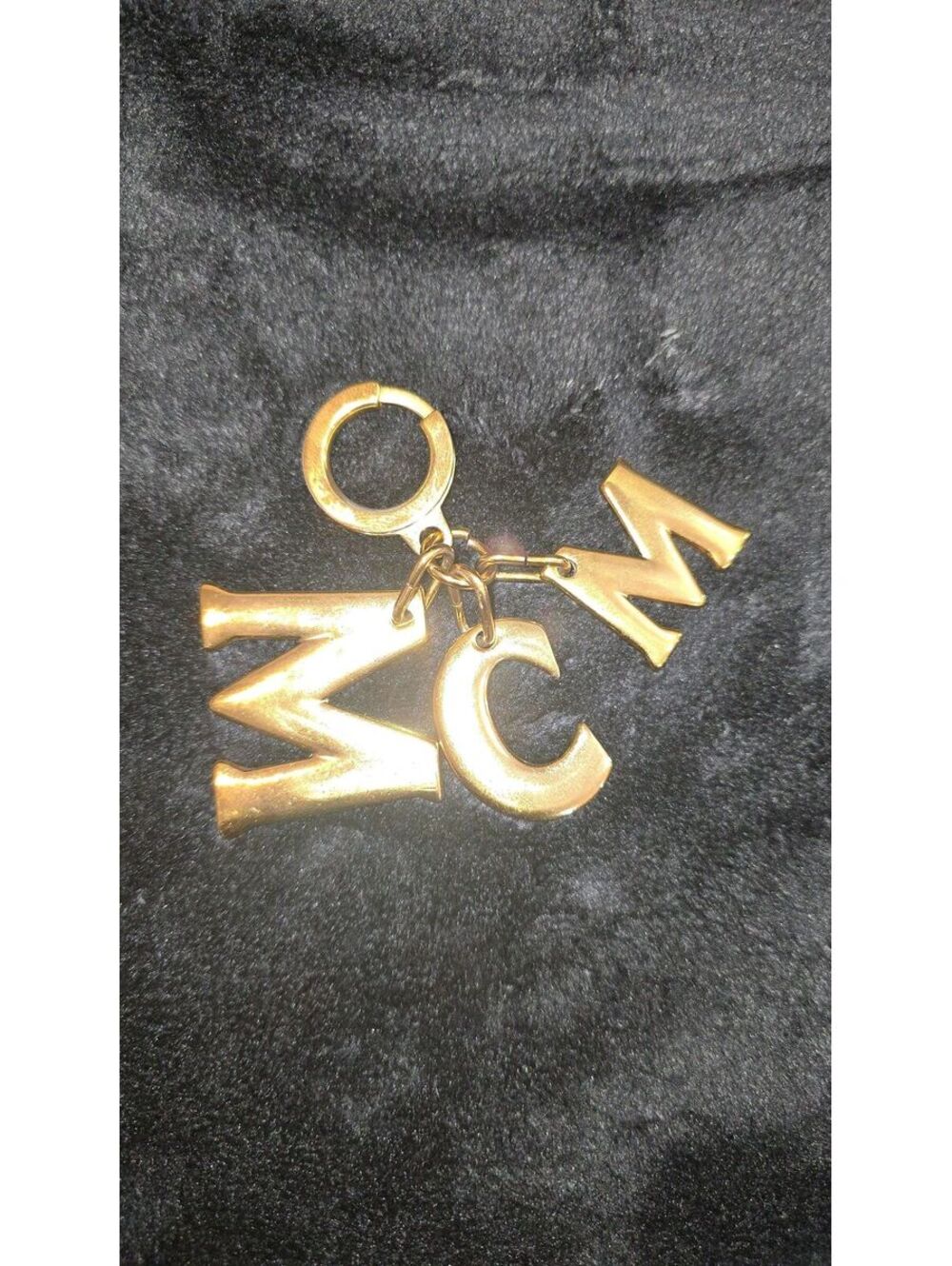 L52. MCM Gold Charm (Metal)